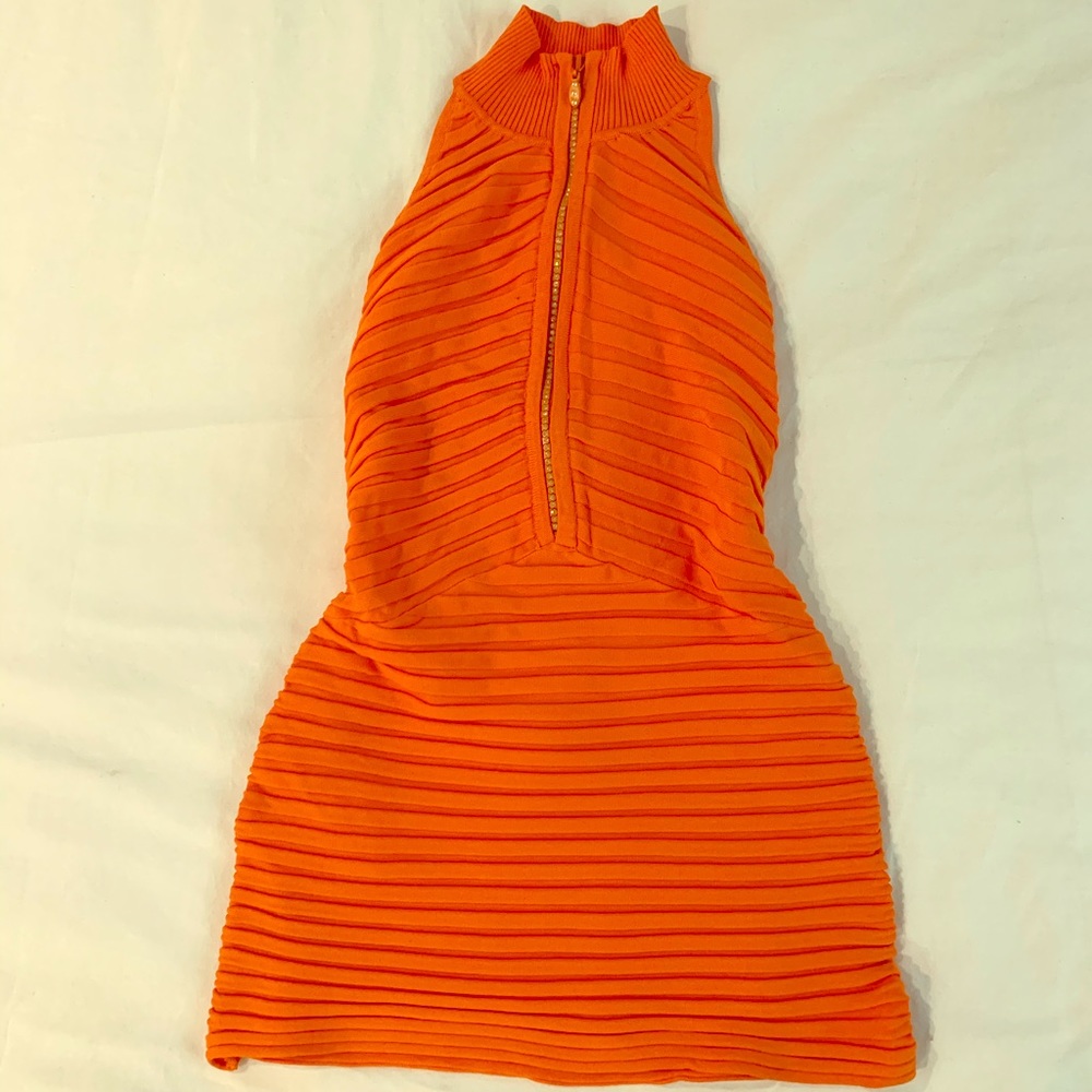 Tight orange mini dress